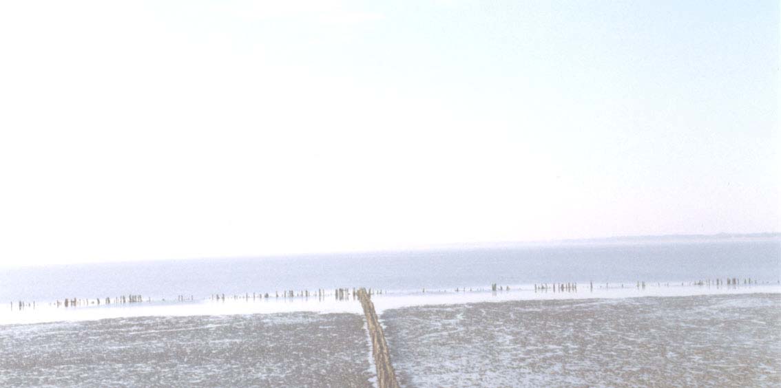 Wolken brechen Sonnenstrahlen Artwork: Buhne im Wattenmeer